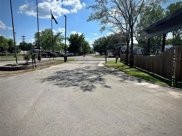a view of a park with swings and slides