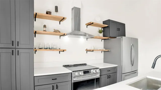 an oven in a kitchen with a white stove top oven