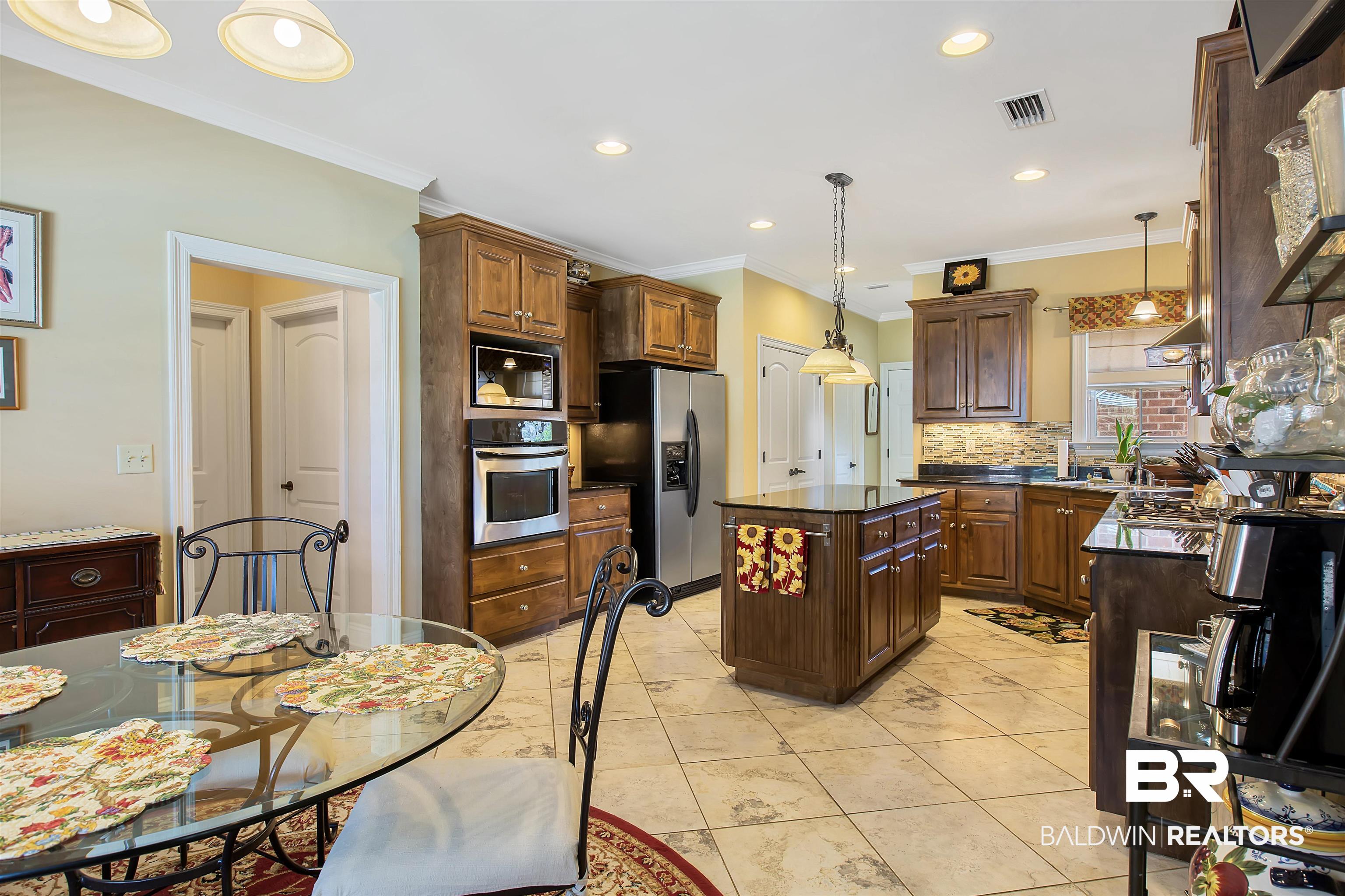 112 Pinnacle Court Fairhope, AL 36532 - Photo 16 of 44 Breakfast Room to Kitchen