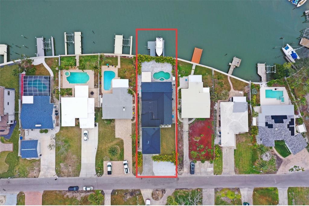 16015 Redington Drive Redington Beach, FL 33708 - Photo 48 of 60 a aerial view of multi story residential apartment building