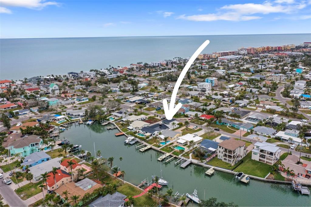 16015 Redington Drive Redington Beach, FL 33708 - Photo 59 of 60 an aerial view of a house with a lake view