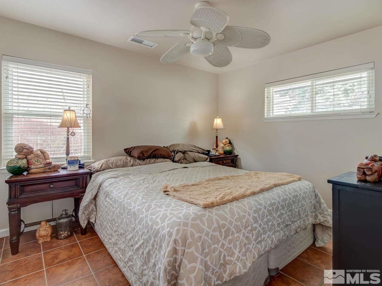 2345 Watt Street Reno, NV 89509 - Photo 12 of 25 a bedroom with bed and window