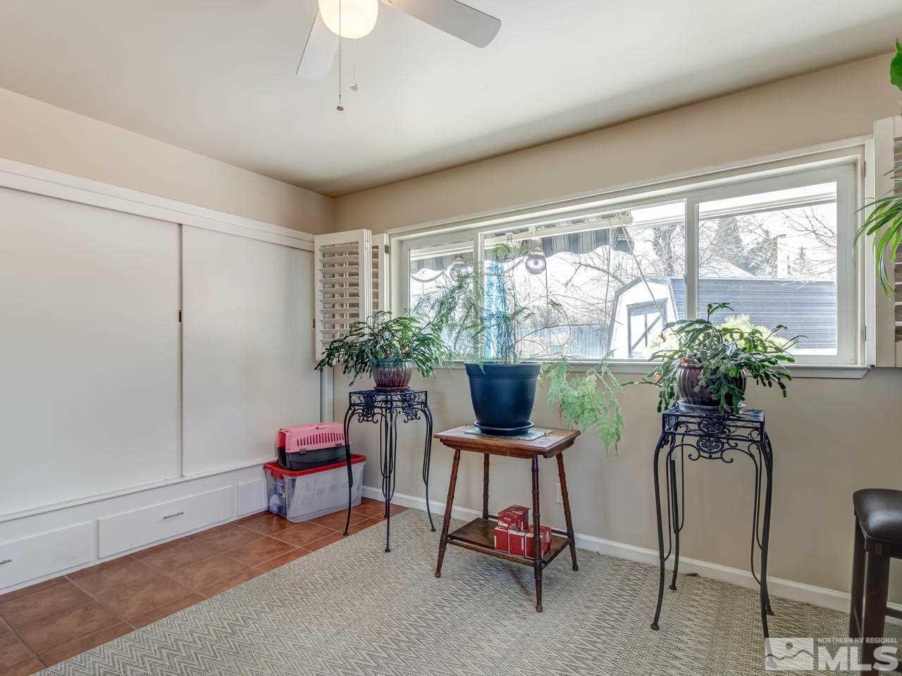 2345 Watt Street Reno, NV 89509 - Photo 14 of 25 a room with furniture and a potted plant