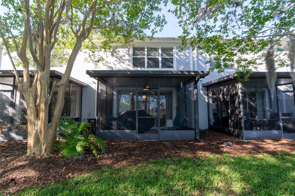 1041 Enclair Street Orlando, FL 32828 - Photo 26 of 62 a front view of a house with garden