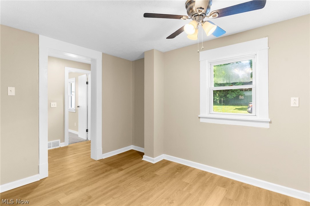 403 Mosier Road Girard, OH 44420 - Photo 19 of 22 Dining room with light wood-type flooring and ceiling fan