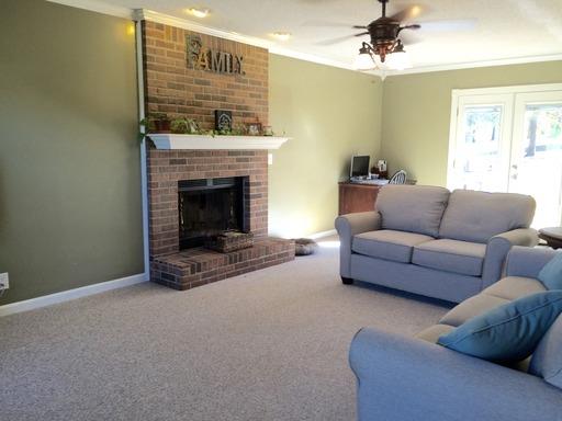 400 Martin Road Clarksville, TN 37042 - Photo 2 of 18 This family room has it all. A gorgeous wood burning fireplace and crown moldings throughout.