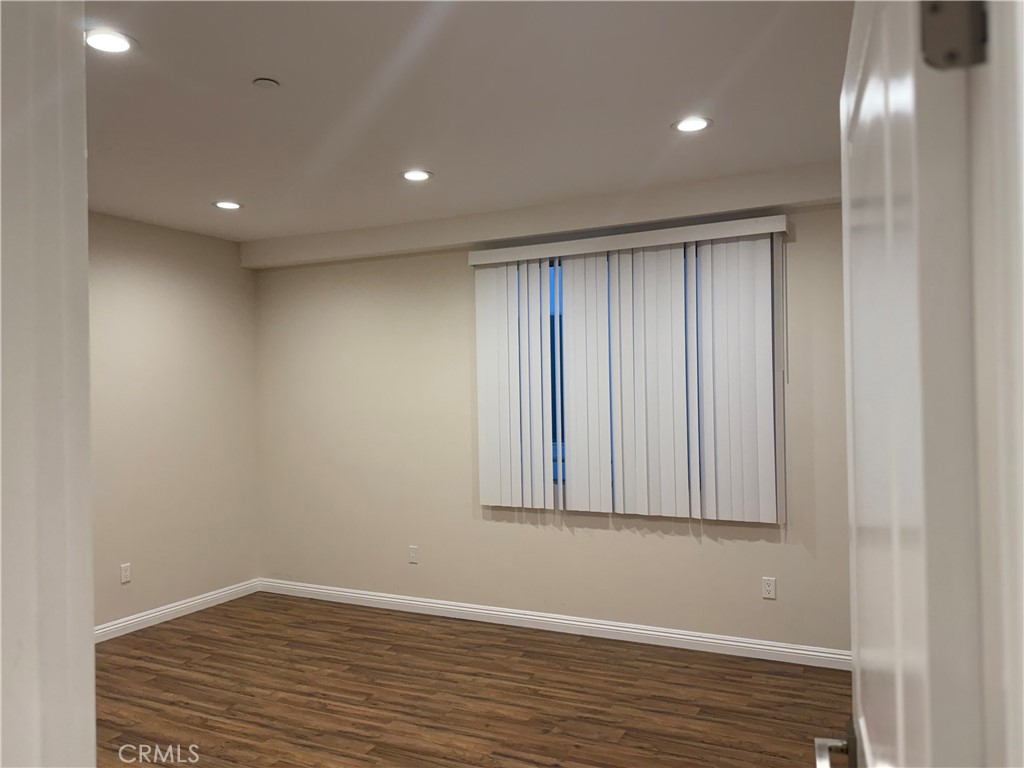 9951 Marcus Avenue, Unit 104 Tujunga, CA 91042 - Photo 8 of 16 a view of room with window