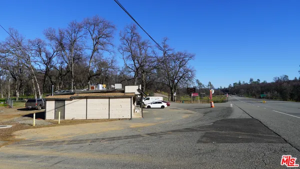 a view of street with houses