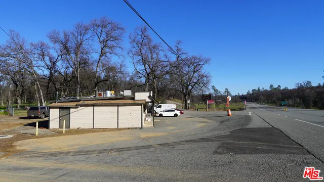 a view of street with houses