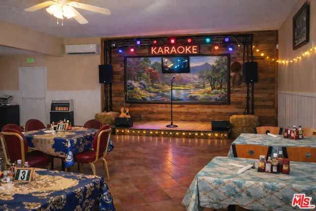 a outdoor living space with furniture and a fireplace