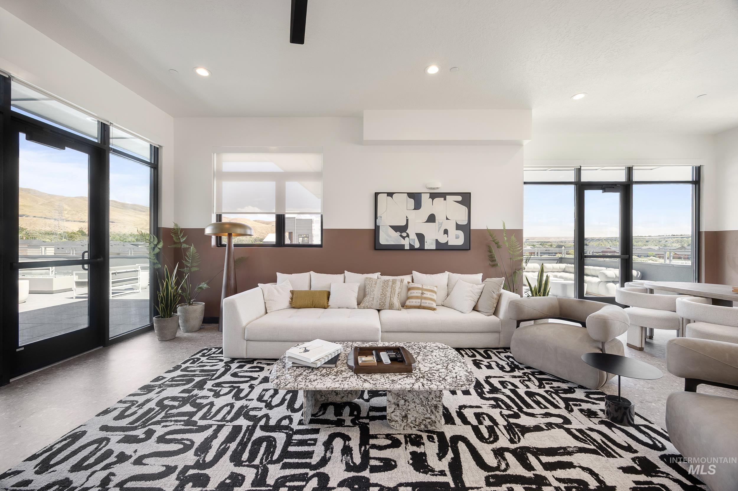 4340 East Haystack Street, Unit 204 Boise, ID 83716 - Photo 41 of 50 Living room featuring healthy amount of natural light, recessed lighting, and a mountain view