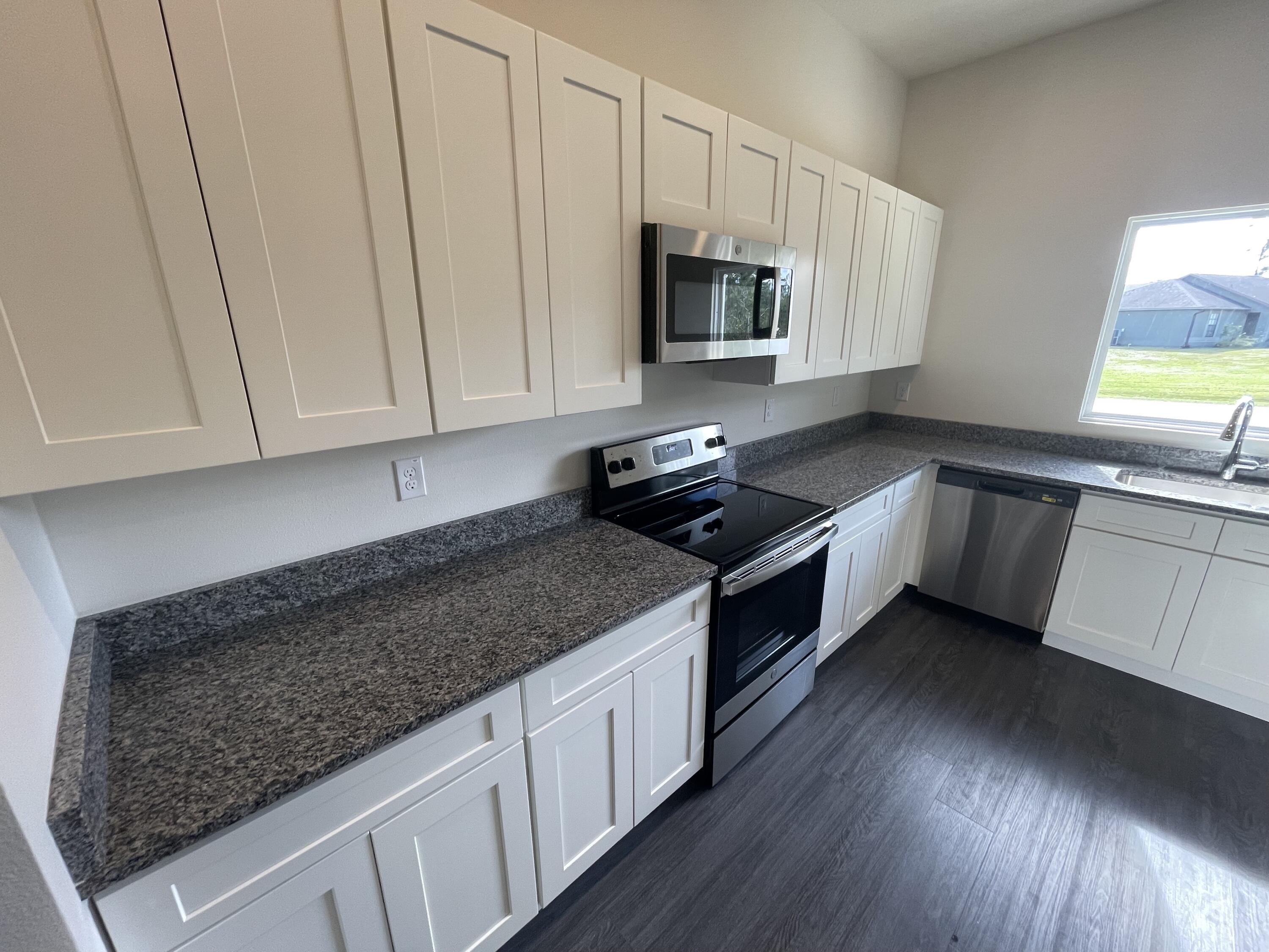 1203 Sexton Road Southwest Palm Bay, FL 32908 - Photo 3 of 10 Sexton Kitchen 1
