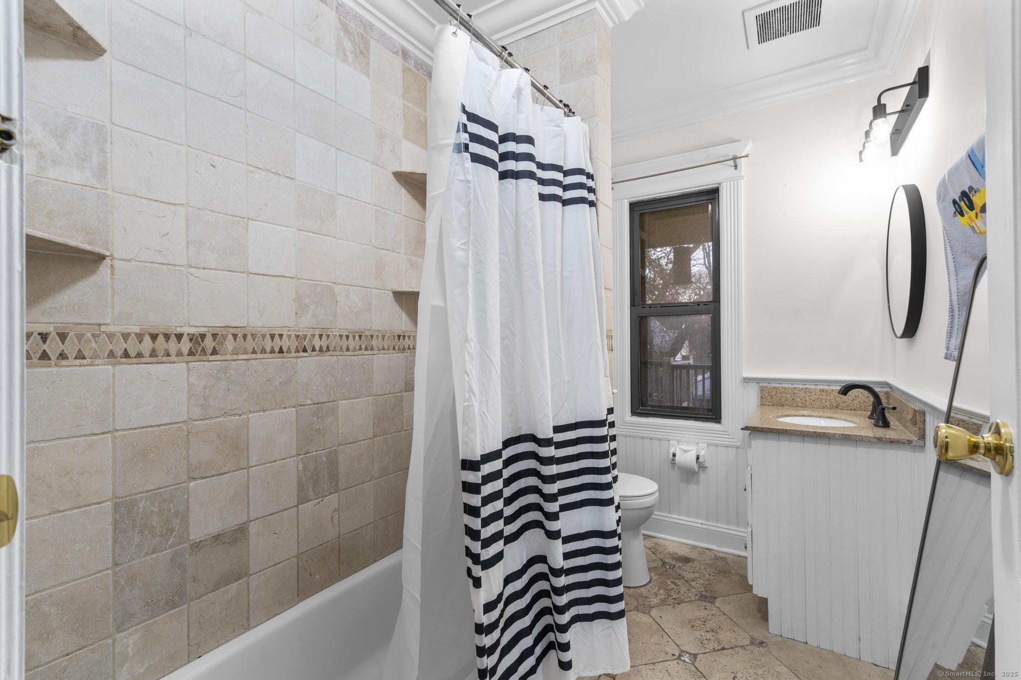 33 Douglas Avenue, Unit 2 Stamford, CT 06906 - Photo 12 of 32 a bathroom with a bathtub and a shower