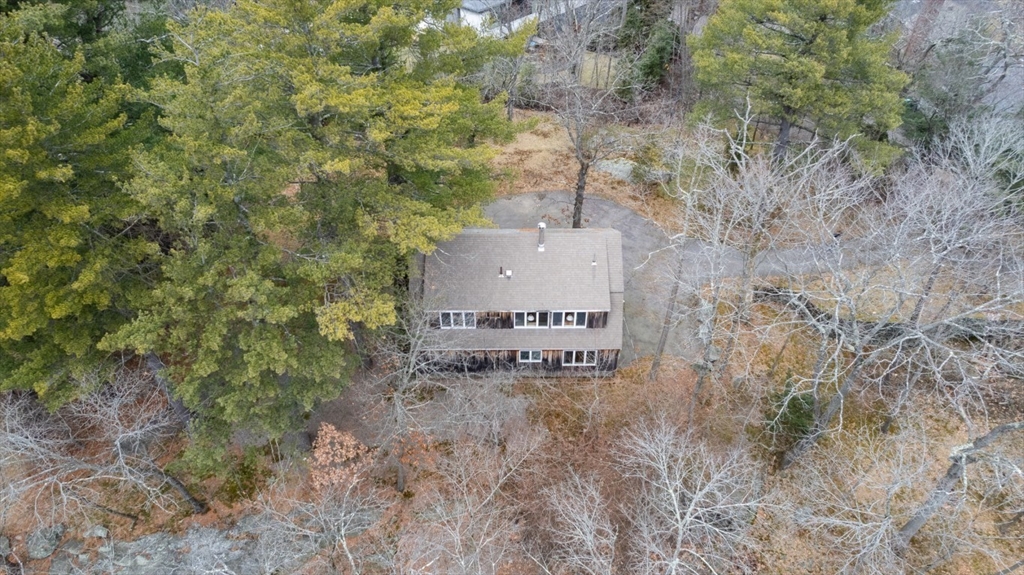 73 Valentine Street Newton, MA 02465 - Photo 22 of 26 a sign of golf club on a stone wall