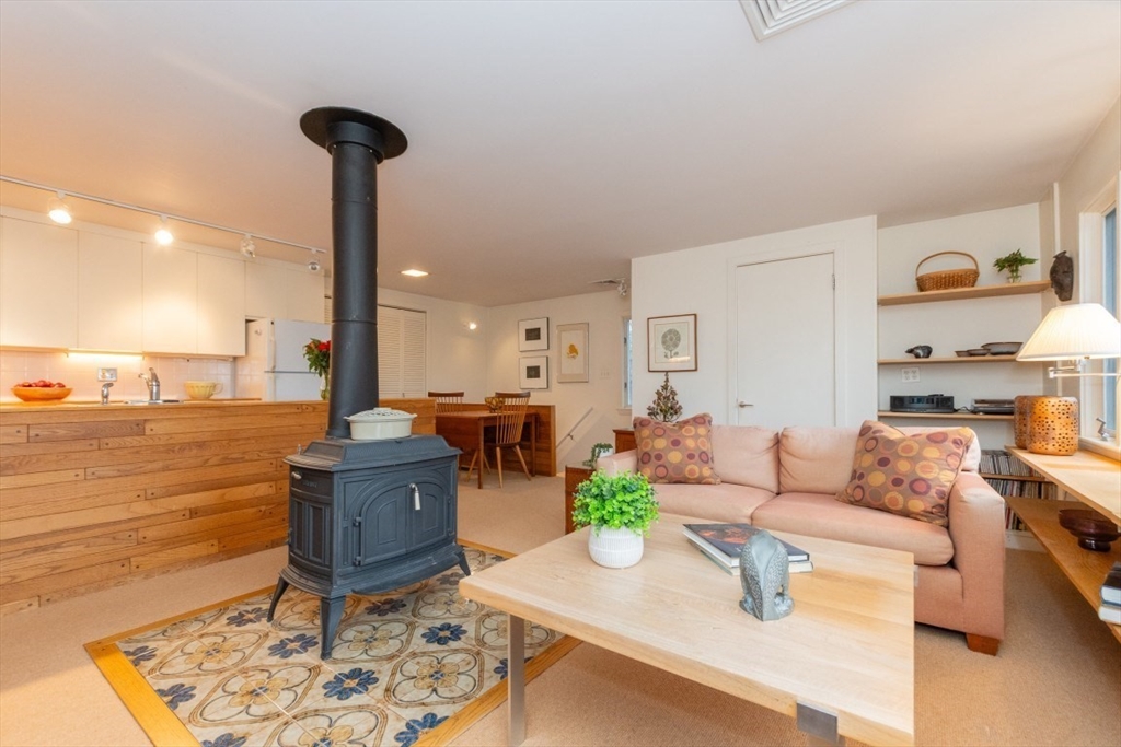 73 Valentine Street Newton, MA 02465 - Photo 4 of 26 a living room with furniture
