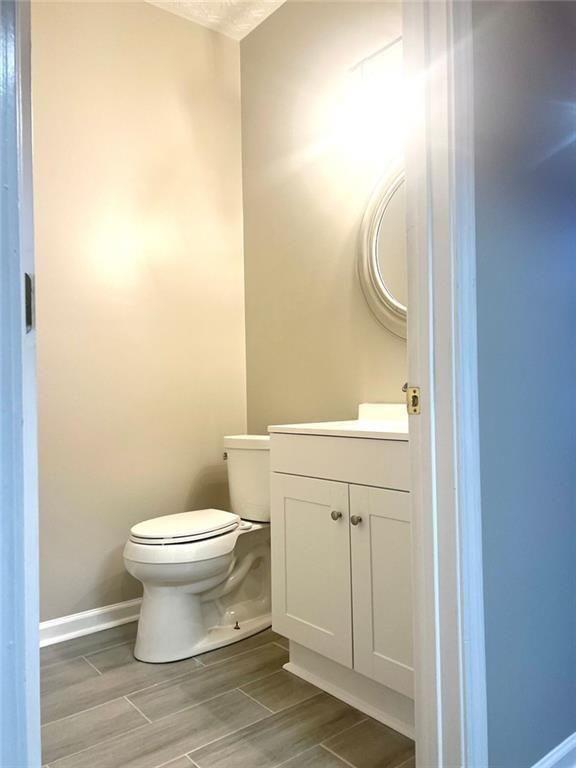 3854 Austin Park Lane Decatur, GA 30032 - Photo 16 of 44 a bathroom with a sink and a toilet
