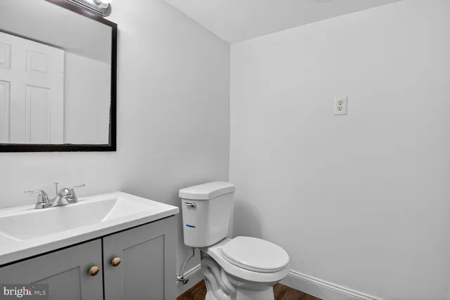 a view of a field with a tree