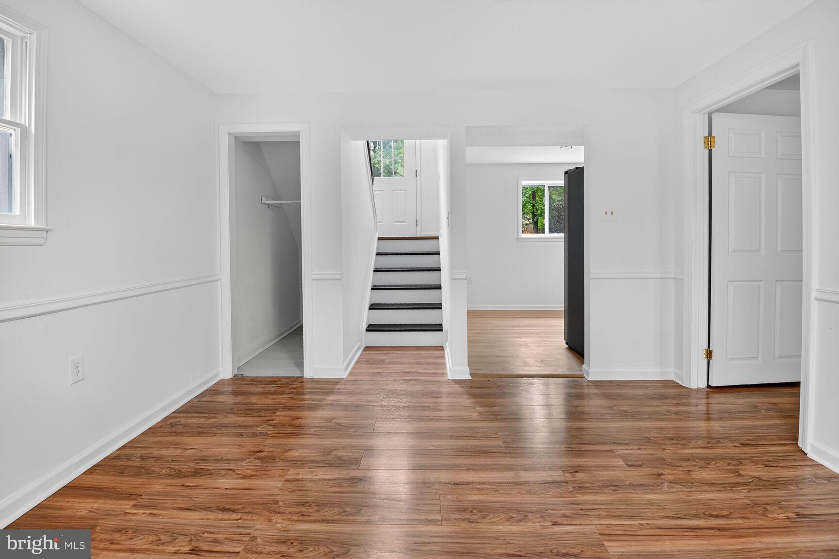 202 East Gordon Street Sterling, VA 20164 - Photo 4 of 20 a view of empty room with wooden floor