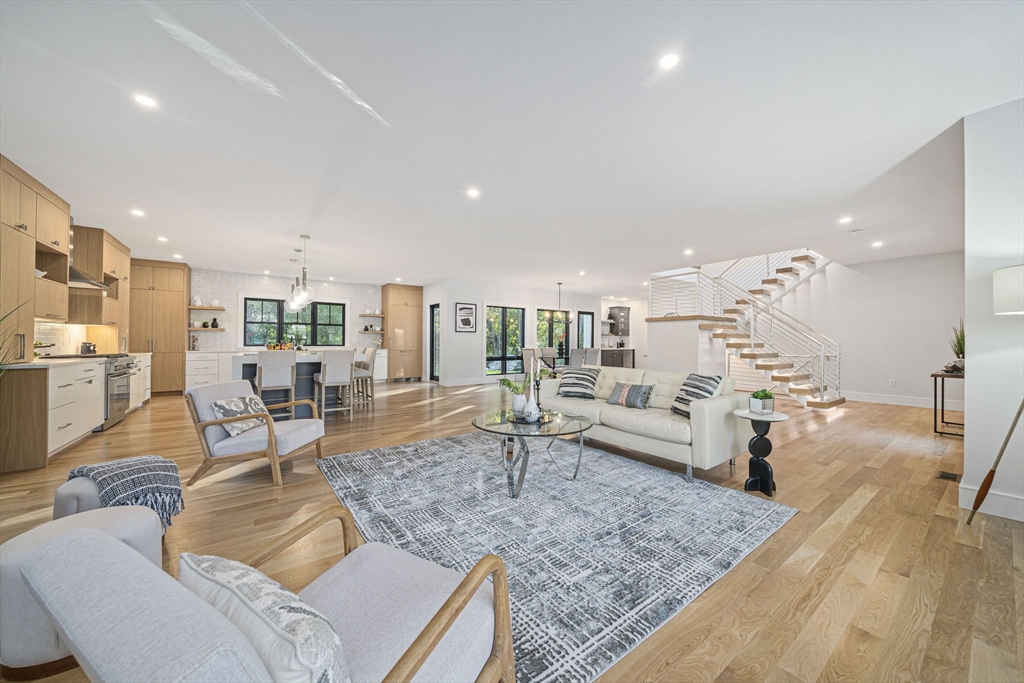 7 Ashcroft Road Sharon, MA 02067 - Photo 11 of 36 a living room with furniture and a table