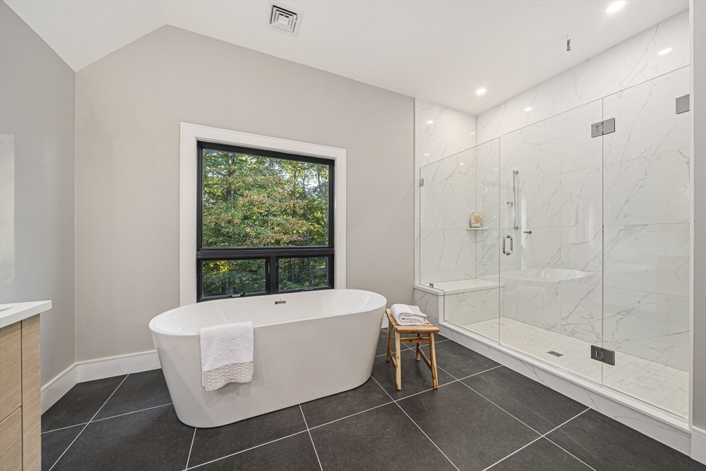 7 Ashcroft Road Sharon, MA 02067 - Photo 22 of 36 a room with a large window and table