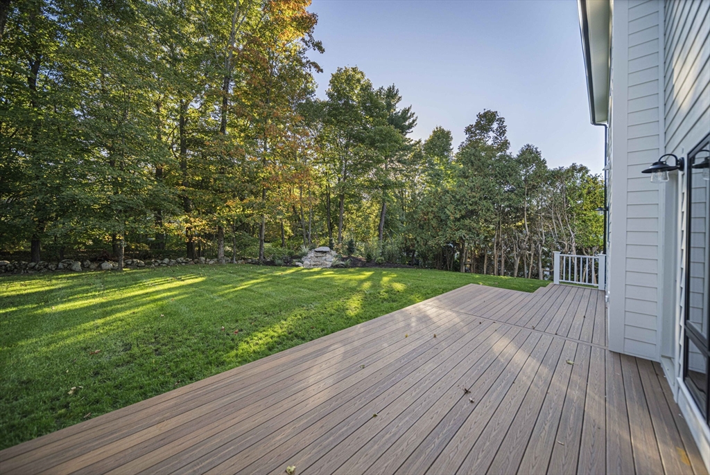 7 Ashcroft Road Sharon, MA 02067 - Photo 33 of 36 a view of a yard with wooden floor