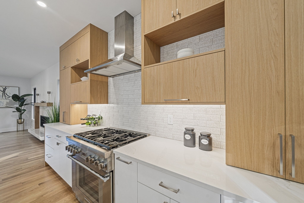 7 Ashcroft Road Sharon, MA 02067 - Photo 7 of 36 a kitchen with a stove and a cabinets