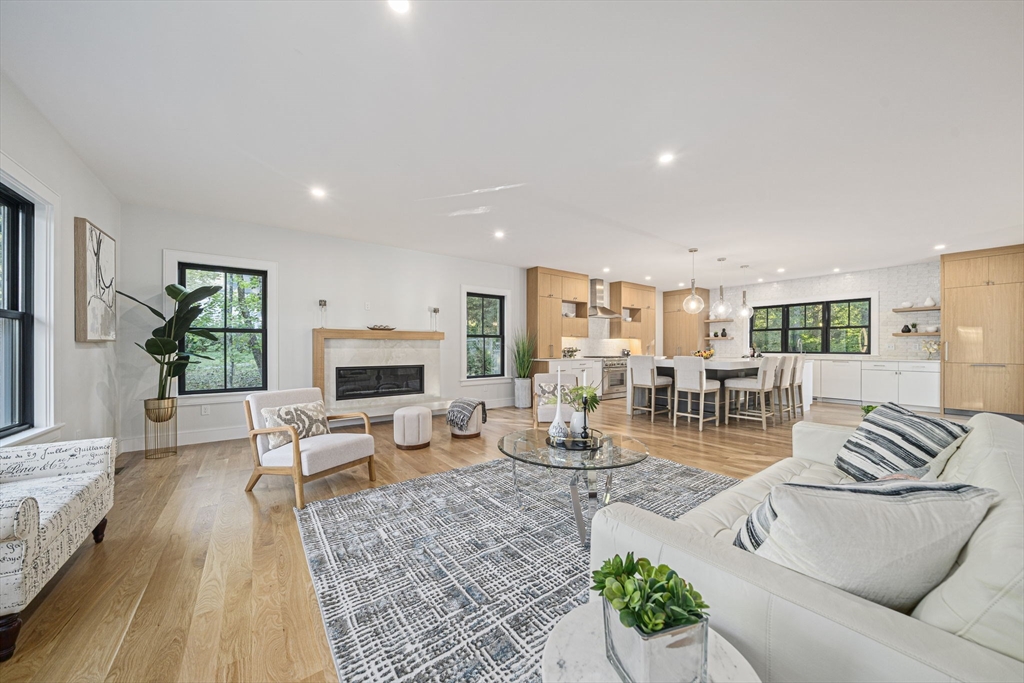7 Ashcroft Road Sharon, MA 02067 - Photo 9 of 36 a living room with furniture and a fireplace