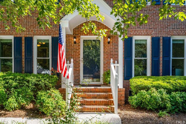 a front view of a house with a porch