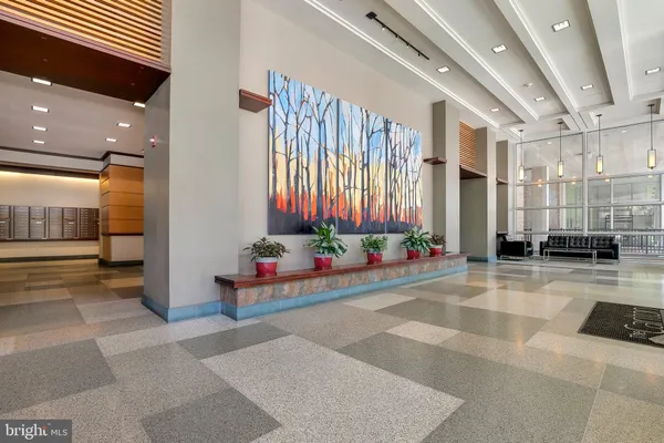 a view of a lobby with furniture and window