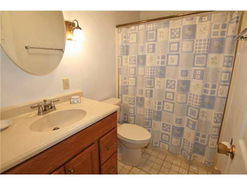 161 Deerfield Road Washington, PA 15301 - Photo 15 of 25 Full Bath. The bath has neutral dcor, an oak vanity and combination tub/shower...