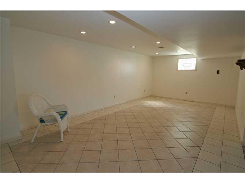161 Deerfield Road Washington, PA 15301 - Photo 19 of 25 Basement/Game Room. The gameroom has plenty of natural light, ceramic tile flooring for easy care and an access door to the rear yard...