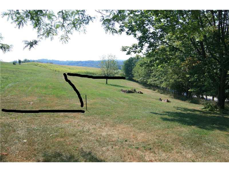161 Deerfield Road Washington, PA 15301 - Photo 23 of 25 Land/Lot. The property line dog-legs to the left at the stake and goes to the edge of the corn field. Stakes are set.