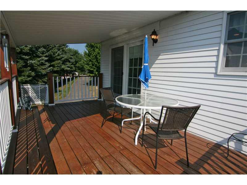 161 Deerfield Road Washington, PA 15301 - Photo 10 of 25 Patio/Deck. The covered portion of the deck is protected from the weather and provides shaded comfort...