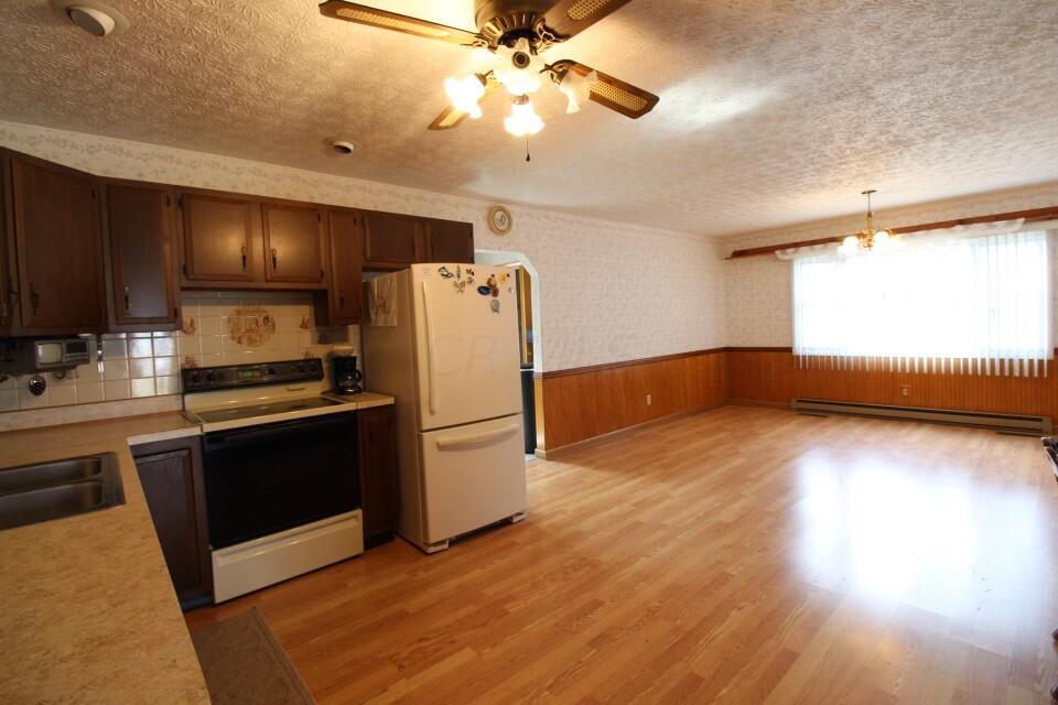 8091 Cincinnati-Zanesville Road Southwest Amanda, OH 43102 - Photo 7 of 24 Spacious Kitchen and Dining Room