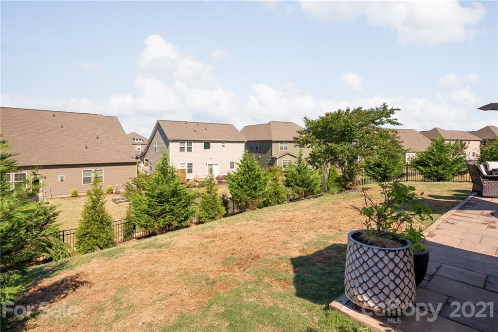 3026 Oakmere Road Waxhaw, NC 28173 - Photo 27 of 27 an outdoor view of a house with garden