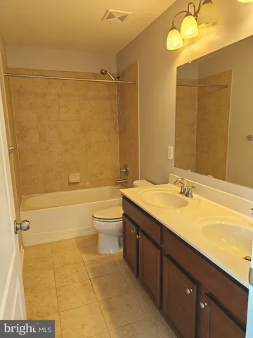 a bathroom with a sink and a bathtub