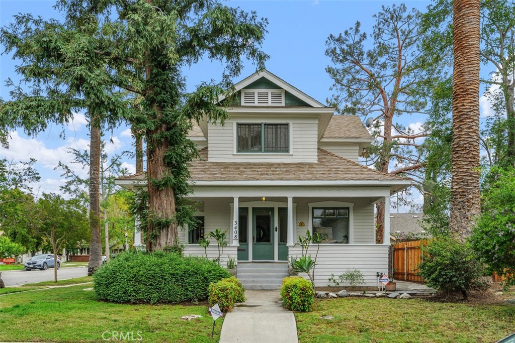 3408 1st Street Riverside, CA 92501 - Photo 1 of 1 a front view of a house with garden