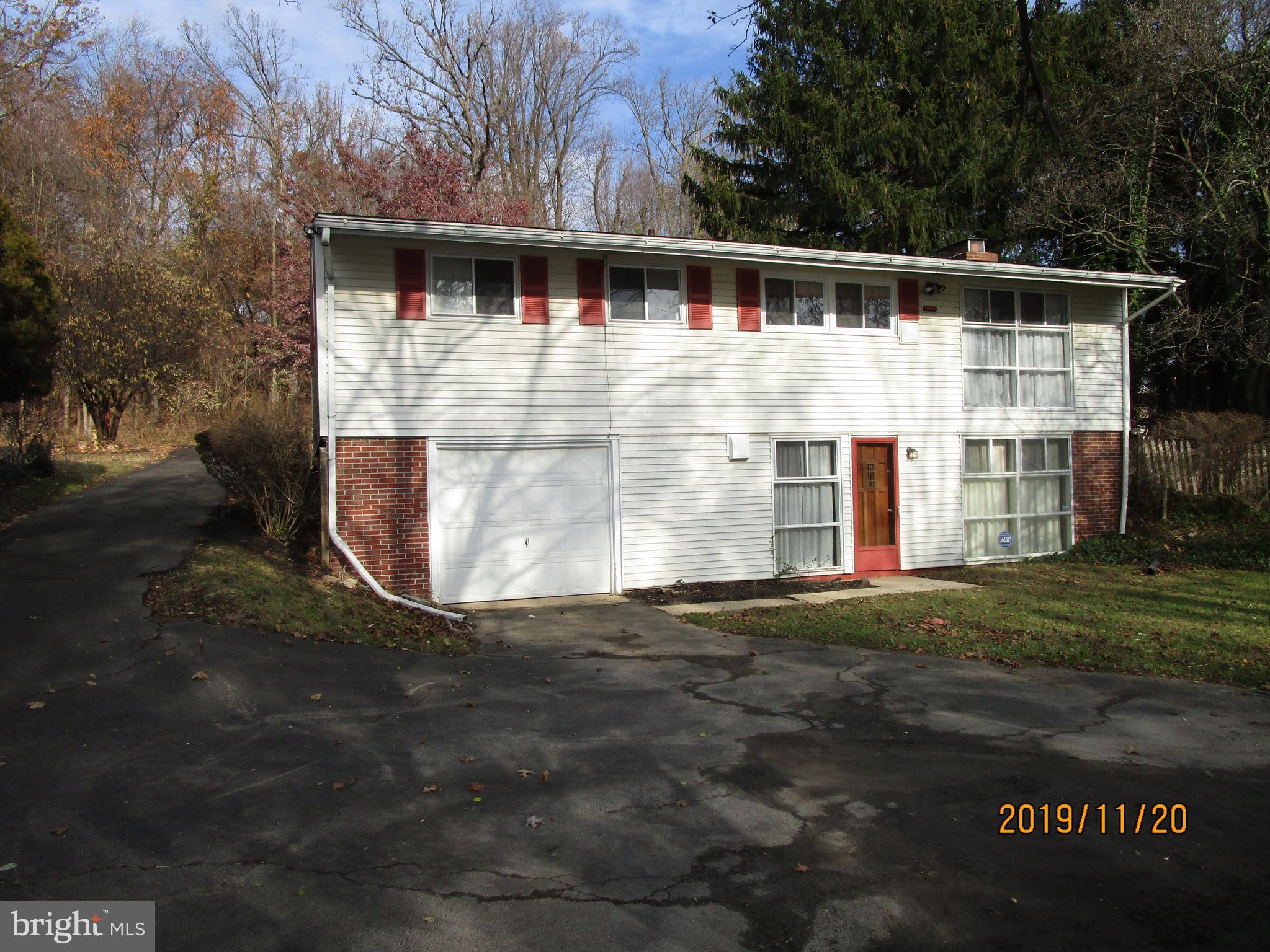 661 Church Road Flourtown, PA 19031 - Photo 3 of 28 Rear/Dr/Way/ Garage/ Walkout Bsmt