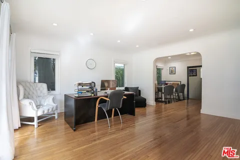 a kitchen with stainless steel appliances a refrigerator and a sink