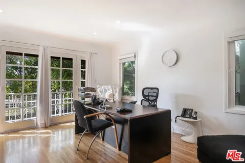 a kitchen with a sink cabinets and stainless steel appliances