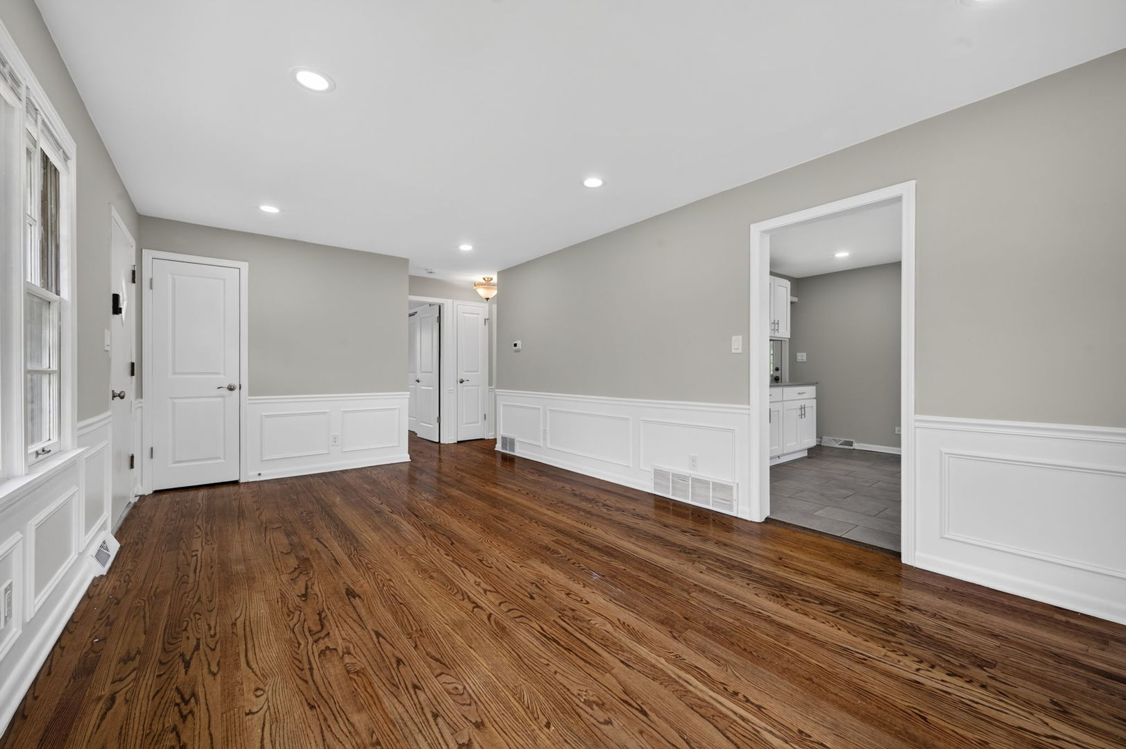 415 Alma Terrace Cary, IL 60013 - Photo 8 of 23 a view of an empty room with wooden floor