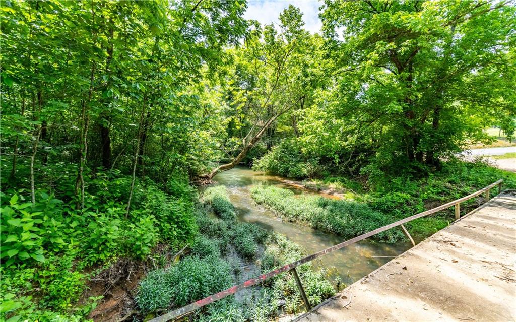 116-ac Pine Hill Road Southeast Rydal, GA 30171 - Photo 15 of 32 a view of a forest from a balcony