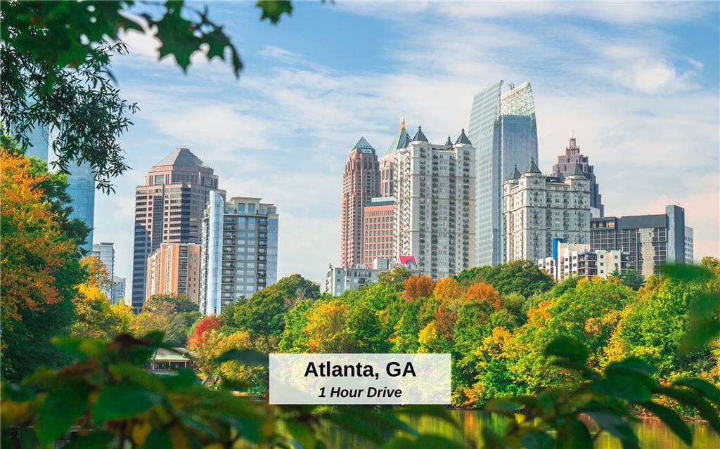 116-ac Pine Hill Road Southeast Rydal, GA 30171 - Photo 31 of 32 a view of a city with tall buildings