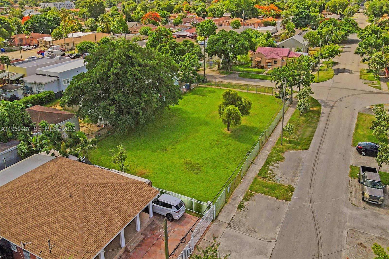 2397 Northwest 34th Street Miami, FL 33142 - Photo 6 of 11 an aerial view of a house