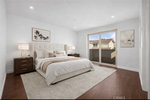 a bedroom with a bed and a cabinets