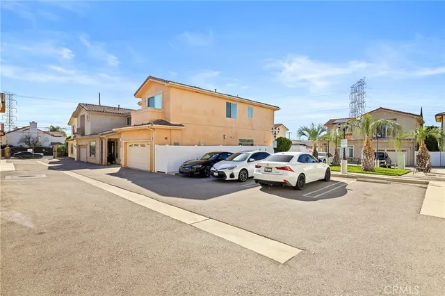 a view of a cars park in front of house
