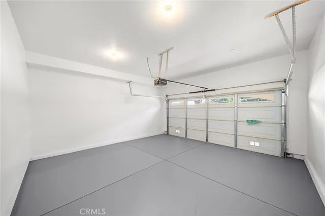 a view of a brick house with many windows