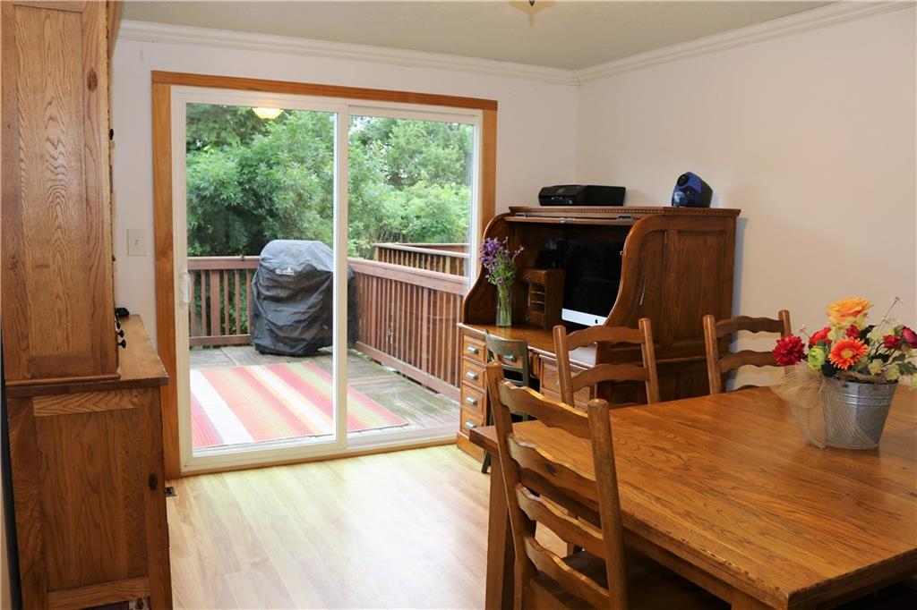 219 Shady Ridge Drive Monroeville, PA 15146 - Photo 6 of 23 Great size dining room leading out to expanded deck with wooded views
