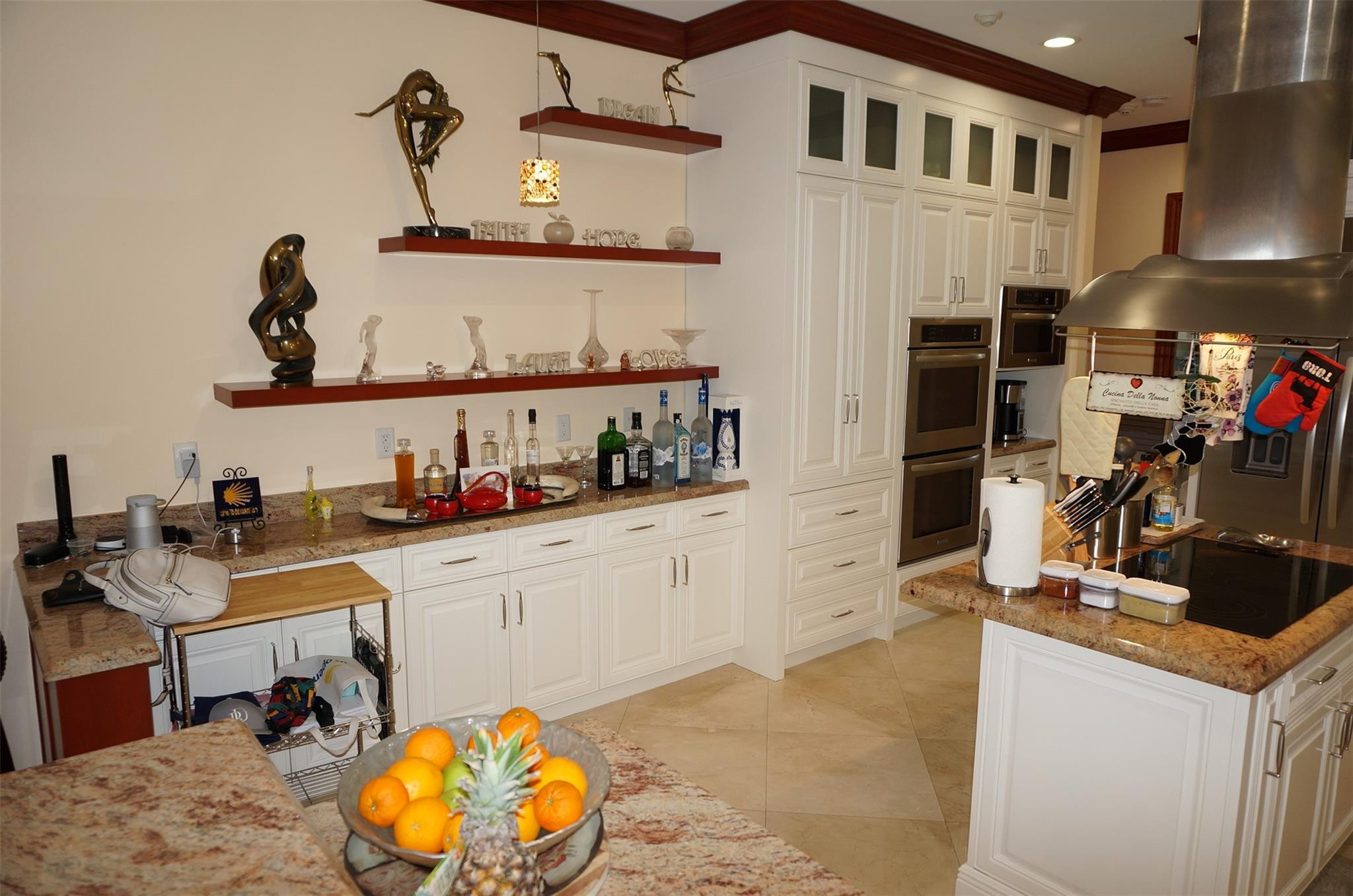 650 East Rambling Drive Wellington, FL 33414 - Photo 14 of 75 a kitchen with a sink cabinets and appliances