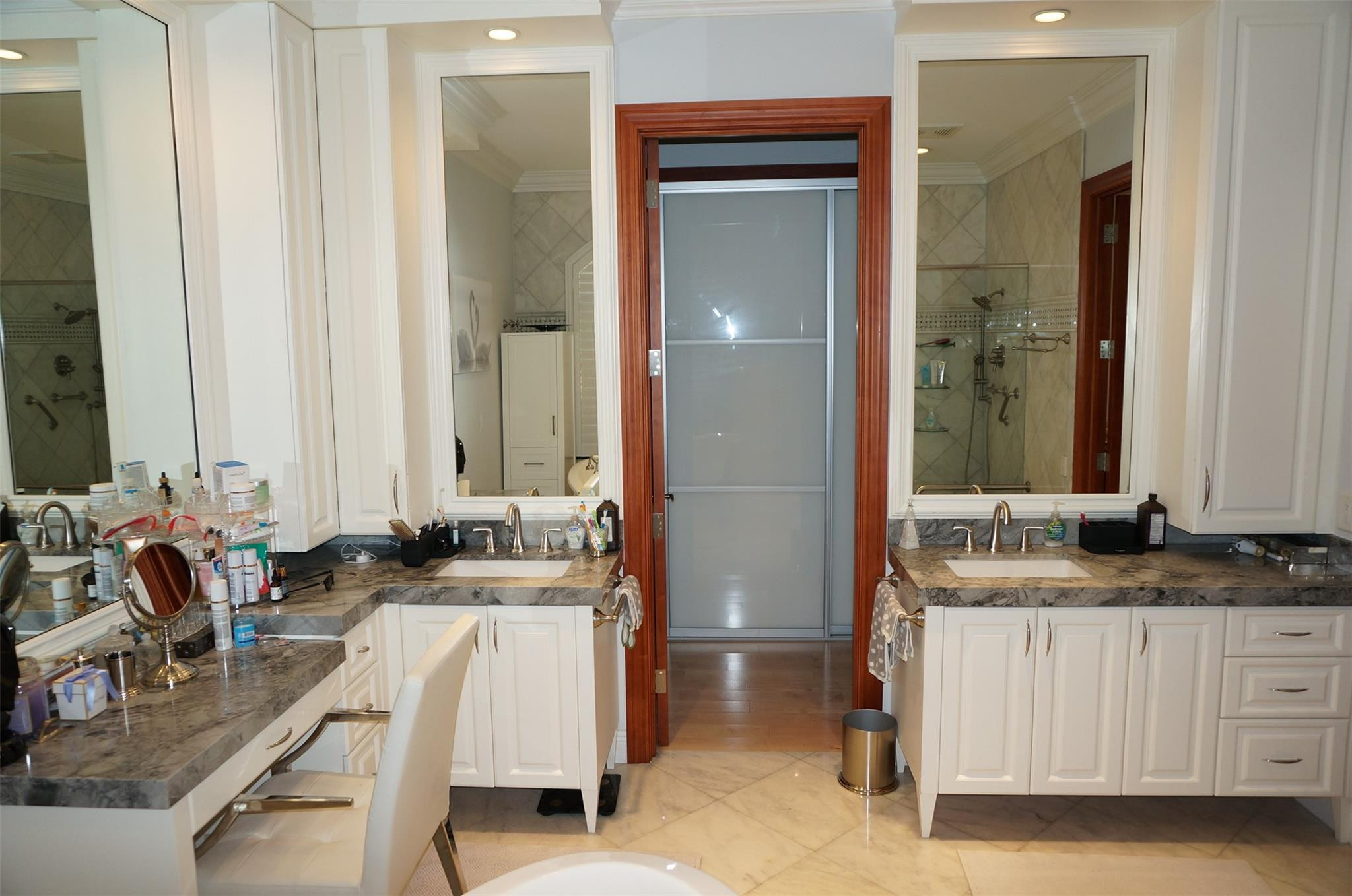 650 East Rambling Drive Wellington, FL 33414 - Photo 23 of 75 a bathroom with a granite countertop sink and a mirror